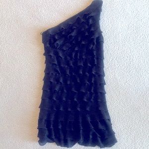 Fun and flirty ruffle black mini dress